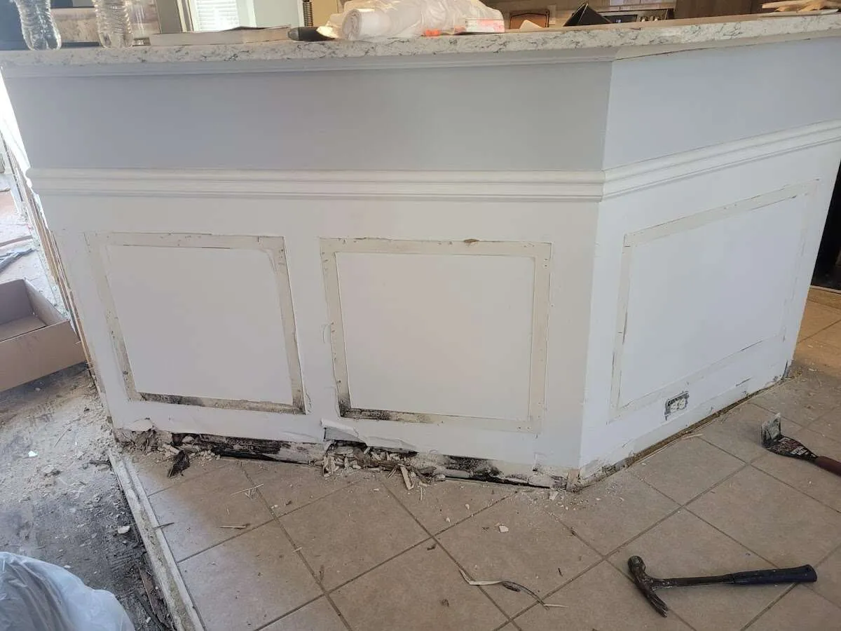 Water damage and mold on kitchen during Storm Damage Restoration in Fort Gratiot